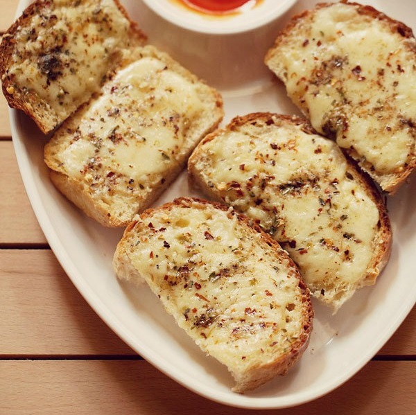 Order Garlic Bread With Sauce & Mozzarella food online from Brothers Pizza store, Clinton on bringmethat.com