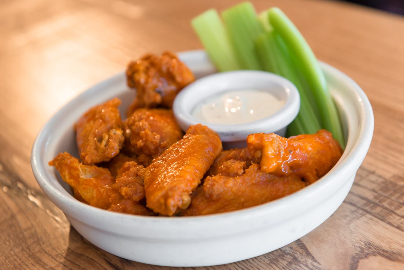 Order Traditional Wings food online from 2 Guys & A Pie Pizzeria store, Bonaire on bringmethat.com