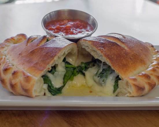 Order Popeye’s Favorite Calzone food online from 2 Guys & A Pie Pizzeria store, Bonaire on bringmethat.com