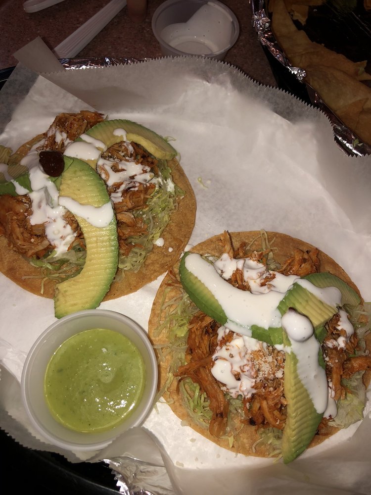 Order Tostadas de Tinga de Pollo (2) food online from Las Tortugas store, Germantown on bringmethat.com