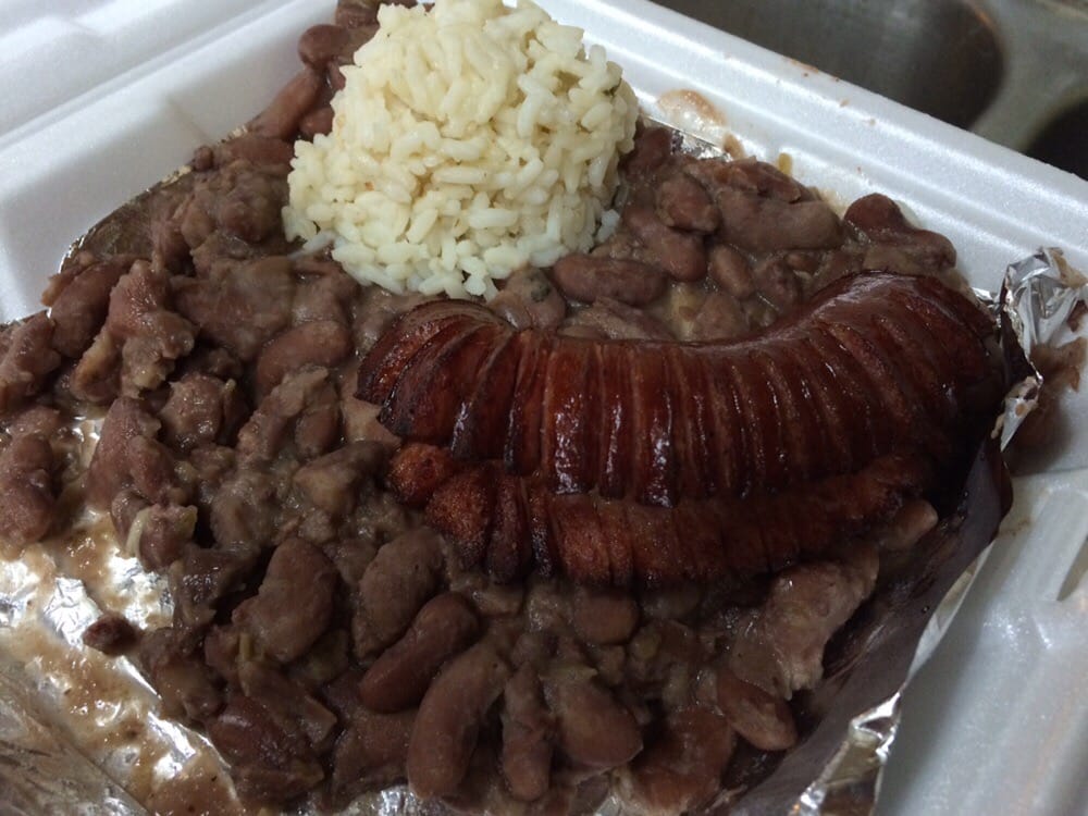 Order Red Beans , Rice & Sausage food online from Acadiana Cafe store, San Antonio on bringmethat.com