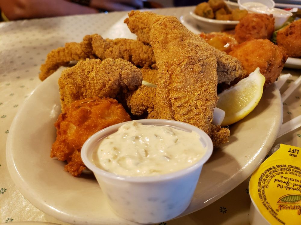 Order Fried Catfish food online from Acadiana Cafe store, San Antonio on bringmethat.com