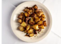 Order Roasted Rosemary Potatoes food online from Carrabba's - The Original On Kirby store, Houston on bringmethat.com