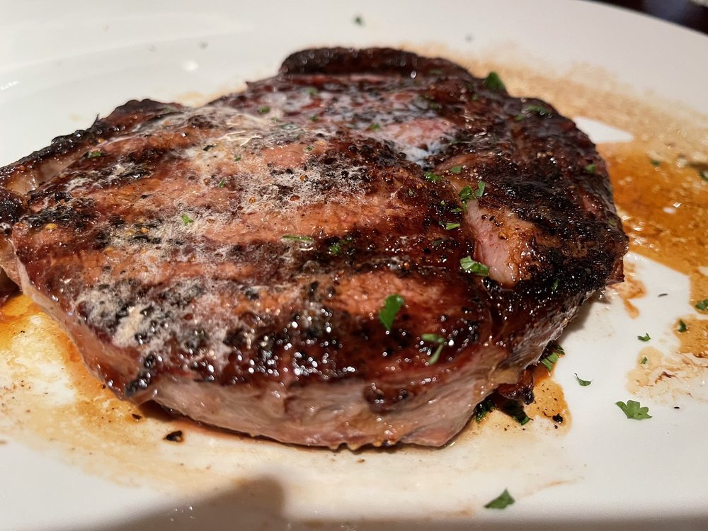 Order Aged Beef Ribeye food online from Pappadeaux Seafood Kitchen store, Houston on bringmethat.com
