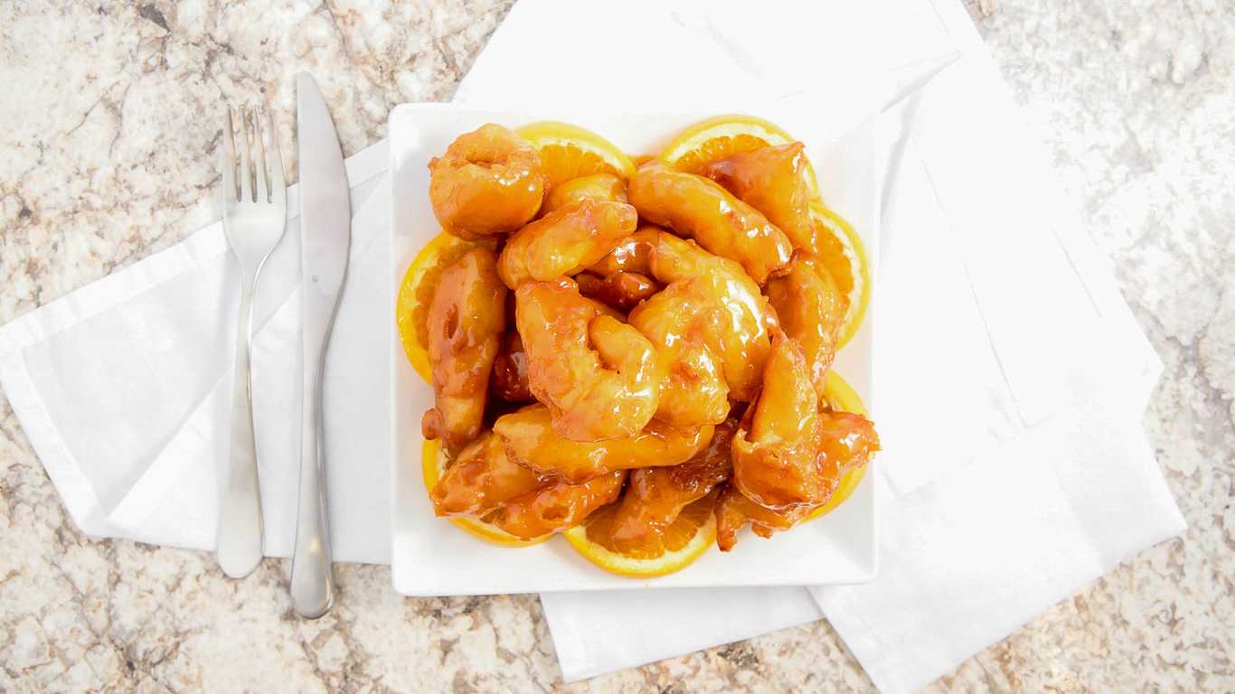 Order L29 - Orange Chicken, Egg Roll food online from Wok-King Cafe Inc store, West Jordan on bringmethat.com