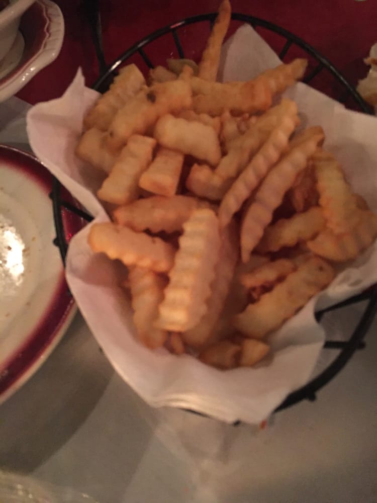 Order French Fries food online from Gigis Italian Restaurant store, St Pete Beach on bringmethat.com