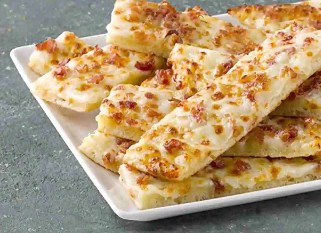 Order Bacon Cheesesticks (10 IInc) food online from Papa John's Pizza store, Starkville on bringmethat.com