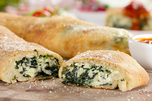 Order Sausage, Spinach & Mozzarella Stromboli food online from Renzo's Boca Raton store, Boca Raton on bringmethat.com
