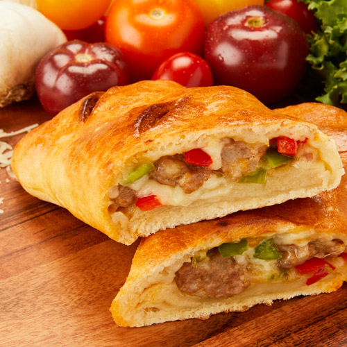 Order Sausage, Onions, Peppers & Mozzarella Stromboli food online from Renzo's Boca Raton store, Boca Raton on bringmethat.com