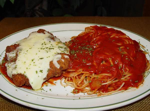 Order Veal Chop Parmigiana with Pasta food online from Renzo's Boca Raton store, Boca Raton on bringmethat.com