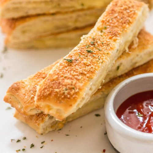 Order Breadsticks food online from The Brothers Three store, Marinette on bringmethat.com