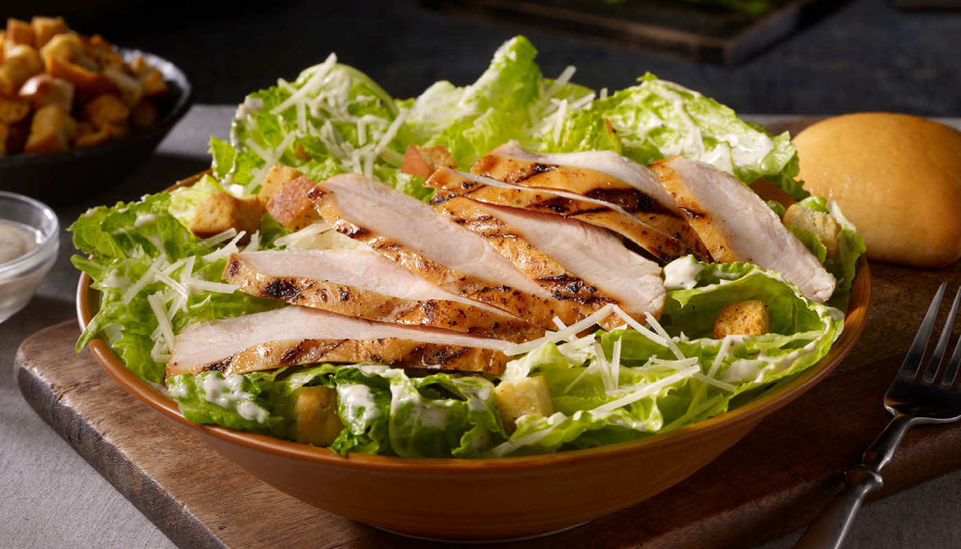 Order Chicken Caesar Salad food online from Dickey's Barbecue Pit store, Centereach on bringmethat.com