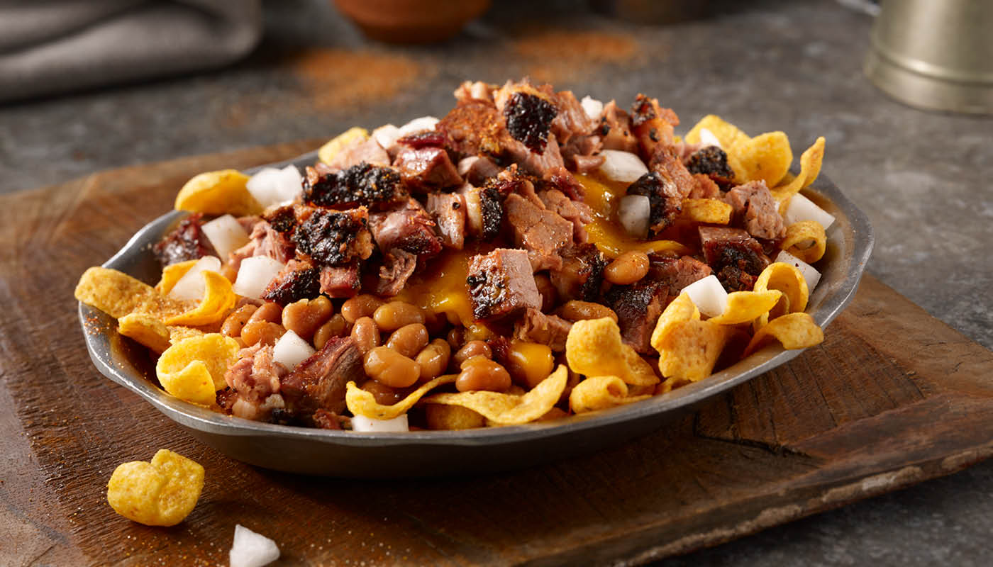 Order Fritos Pie Stack food online from Dickey's Barbecue Pit store, Panama City Beach on bringmethat.com
