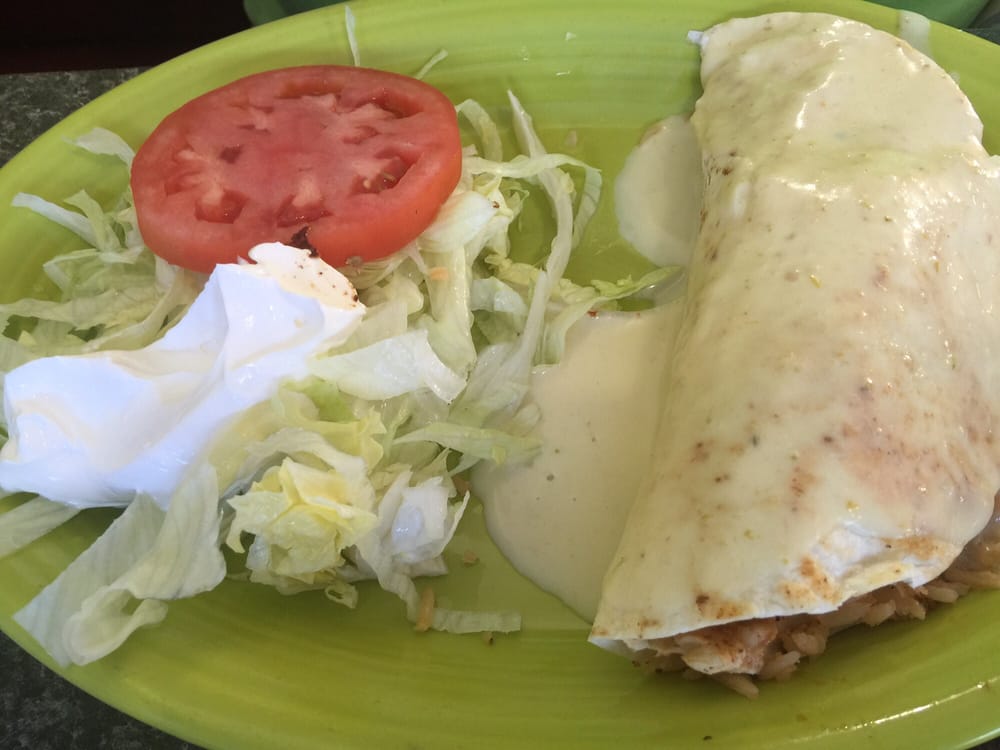 Order Chimichanga food online from Guacamole's Mexican Restaurant store, Clarksville on bringmethat.com