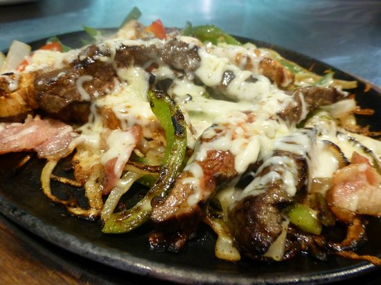 Order El Patron's Fajita food online from West Egg Cafe store, Chicago on bringmethat.com