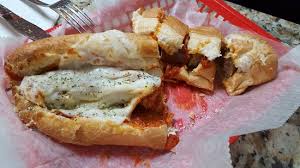 Order Sausage Parm food online from Slice of Life Pizzeria store, Sprng Hill on bringmethat.com