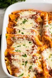 Order Manicotti food online from Slice of Life Pizzeria store, Sprng Hill on bringmethat.com