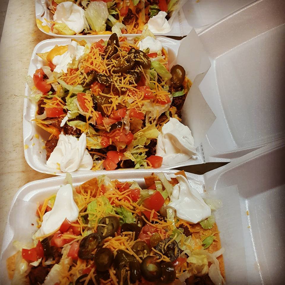 Order Deluxe Nachos food online from Niko's Pizzeria store, Joliet on bringmethat.com