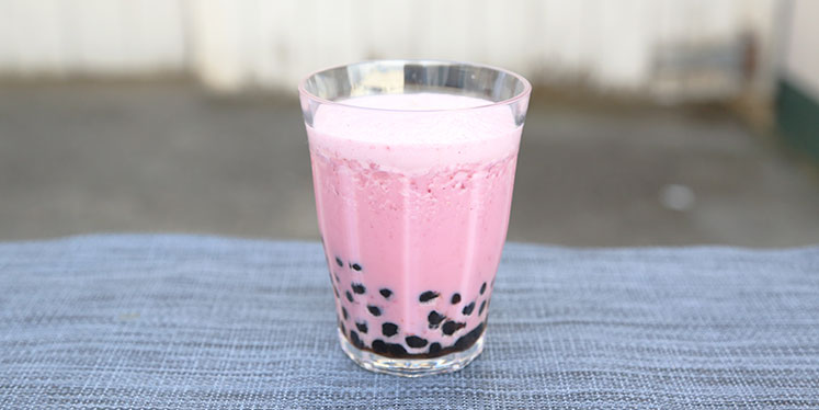 Order STRAWBERRY MILK TEA food online from Asian Foods Market-Restaurant store, Starkville on bringmethat.com