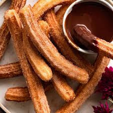 Order Churros food online from Arepas Coffee & Bar store, Starkville on bringmethat.com