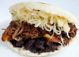 Order Arepa Pabellon food online from Arepas Coffee & Bar store, Starkville on bringmethat.com