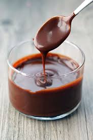 Order Chocolate Syryp food online from Arepas Coffee & Bar store, Starkville on bringmethat.com