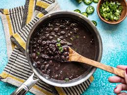 Order Black Beans food online from Arepas Coffee & Bar store, Starkville on bringmethat.com
