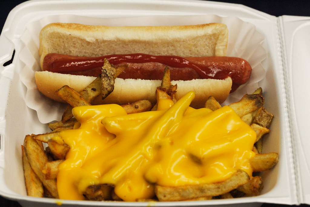 Order Cheese Fries Hot Dog food online from Arepas Coffee & Bar store, Starkville on bringmethat.com