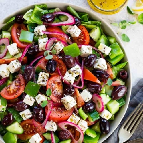 Order Greek Salad food online from Lost Pizza Co Starkville store, Starkville on bringmethat.com