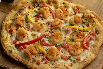 Order Spicy Shrimp Pizza food online from Newk's Eatery store, Starkville on bringmethat.com
