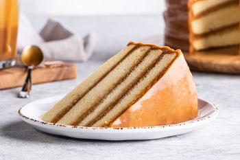 Order Caramel Cake Slice food online from Newk's Eatery store, Starkville on bringmethat.com