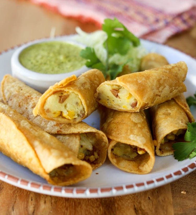 Order Beef or Chicken Flautas topped with Cheese Dip food online from La Terraza store, Starkville on bringmethat.com