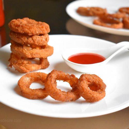 Order ONION RINGS  food online from Rick's Cafe Americain store, Starkville on bringmethat.com