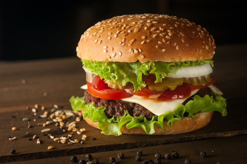 Order HAMBURGER  food online from Rick's Cafe Americain store, Starkville on bringmethat.com