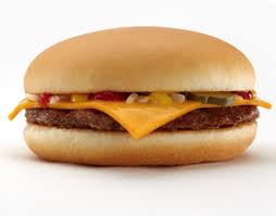 Order CHEESEBURGER food online from Rick's Cafe Americain store, Starkville on bringmethat.com