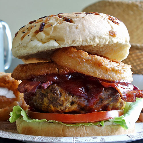 Order COWBOY BURGER food online from Rick's Cafe Americain store, Starkville on bringmethat.com