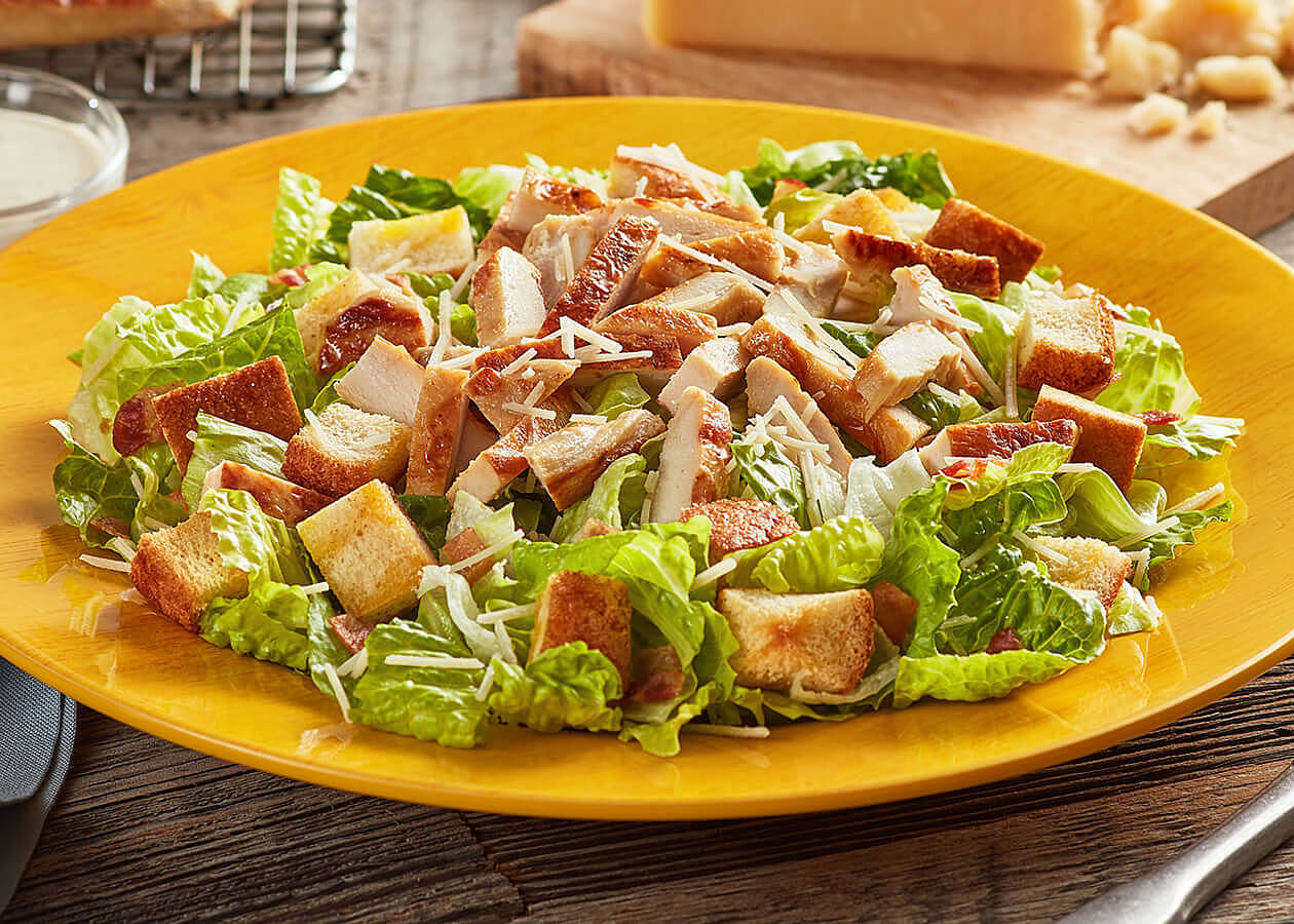 Order The Caesar Zalad® food online from Zaxby's Chicken Fingers & Buffalo Wings store, Starkville on bringmethat.com