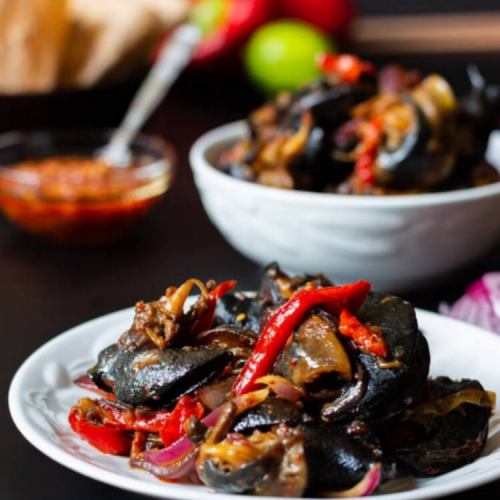 Order Peppered Snail (8 oz.) food online from Divine Express Catering store, Brooklyn on bringmethat.com