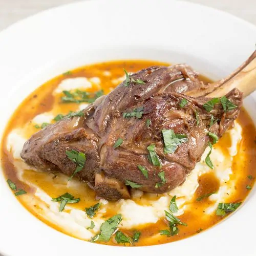 Order Braised & Fried Goat Shanks (2) food online from Divine Express Catering store, Brooklyn on bringmethat.com