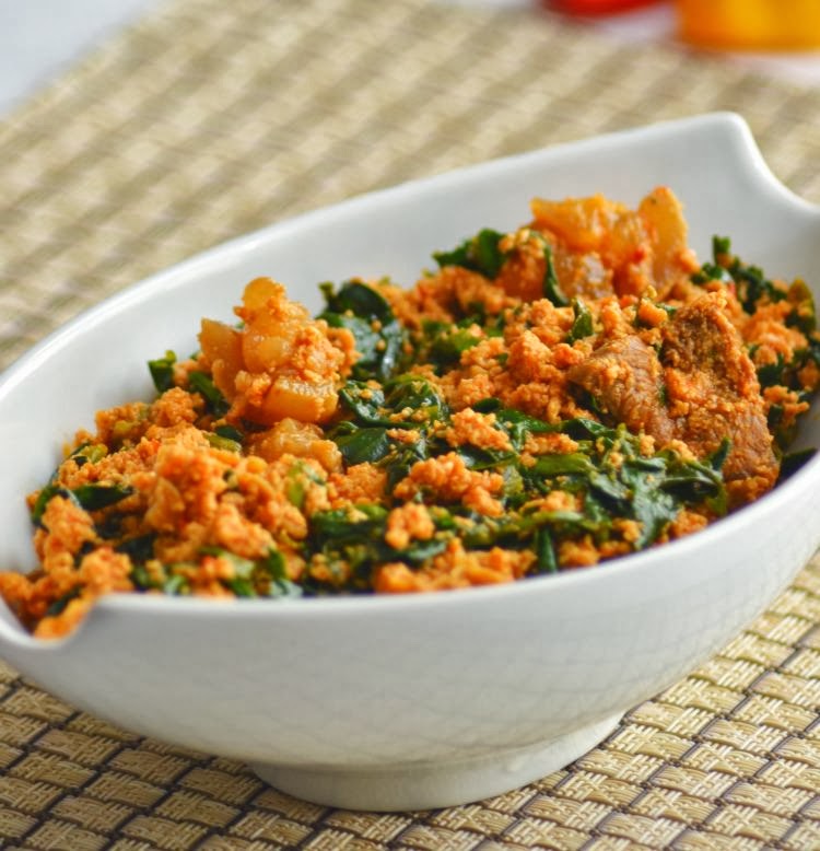 Order Egusi Sauce (Rich Spinach Stew w/ Milled Melon Seed) food online from Divine Express Catering store, Brooklyn on bringmethat.com