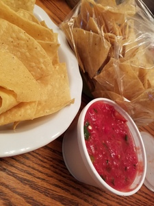 Order 8 oz. Salsa w/ Chips food online from Bandito Burrito Co store, Huntsville on bringmethat.com