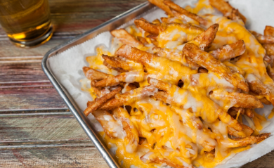 Order CHEESE FRIES food online from Cooter Brown's Tavern store, New Orleans on bringmethat.com