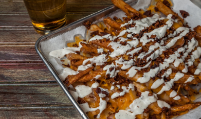 Order BACON RANCH FRIES food online from Cooter Brown's Tavern store, New Orleans on bringmethat.com