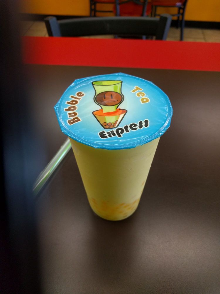 Order Passion Fruit Milk Tea Shaker food online from Bubble Tea Express store, Fayetteville on bringmethat.com