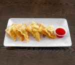 Order 8 Piece Crab Rangoon food online from China Wing Basket store, Columbia on bringmethat.com