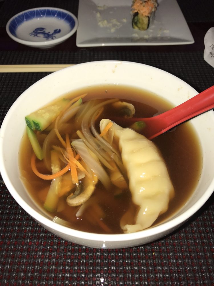 Order 103. Gyoza Soup food online from Laku Sushi store, Morristown on bringmethat.com