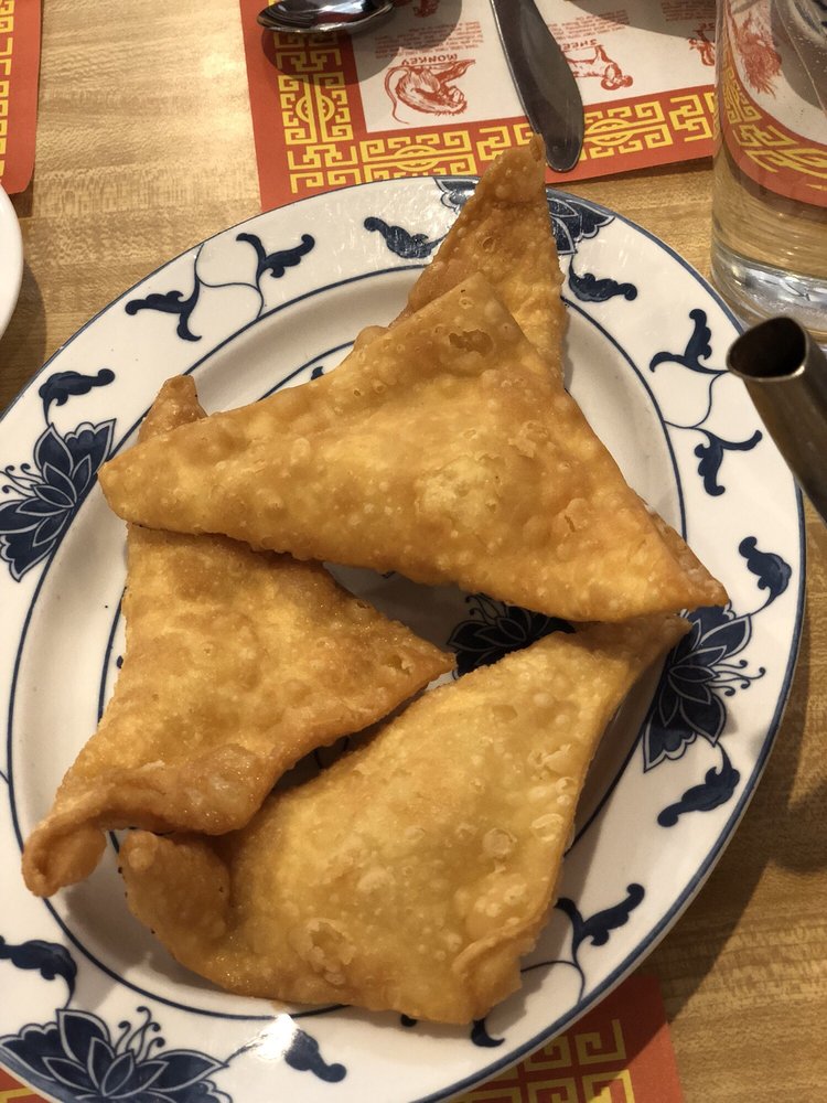 Order 08. Crab Rangoon (6) food online from New Golden Dragon Restaurant store, Buffalo Grove on bringmethat.com