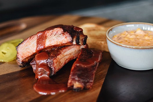 Order Pork Spare Ribs Dinner food online from Fiorella's Jack Stack Barbecue store, Kansas City on bringmethat.com