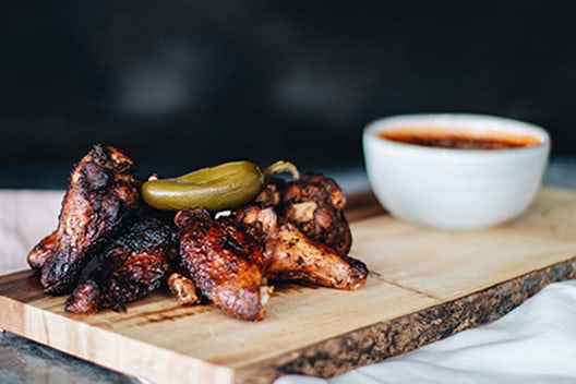 Order Fire-Kissed Wings (10 pieces) food online from Fiorella's Jack Stack Barbecue store, Kansas City on bringmethat.com