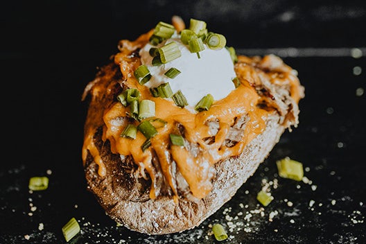 Order Loaded Baked Potato food online from Fiorella's Jack Stack Barbecue store, Kansas City on bringmethat.com